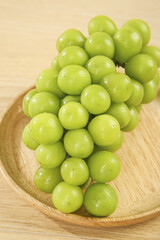 Fresh Green Grapes in Wooden Bowl - Healthy Organic Fruit with Natural Water Droplets