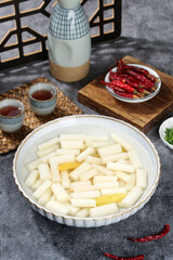 Pickled Lotus Root Tips with Spicy Chilli Peppers - Traditional Asian Cuisine and Tea Service