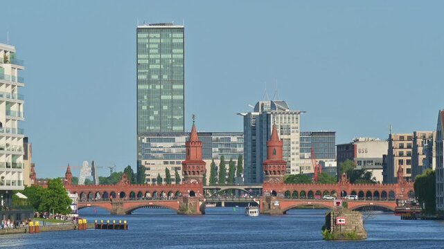 Oberbaumbrucke crossing the River Spree in Berlin on a clear sunny day - Germany