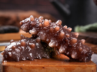 Fresh Sea Cucumber Marine Delicacy on Wooden Board - Asian Seafood Ingredient for Gourmet Cooking