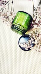 Glass Jar with White Candle and Gypsophila Flowers