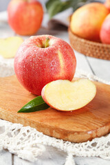 Fresh Red Apples with Water Droplets on Wooden Cutting Board - Healthy Fruit Photography