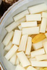 Fresh Lotus Root Slices in Bowl - Asian Vegetable Ingredient for Cooking