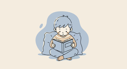 A young boy sits cross-legged, engrossed in reading a book, with a pillow behind him.