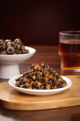 Spicy Stir-Fried Whelk with Pork on Wood Board - Traditional Asian Seafood Dish