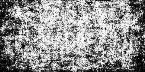 Grunge texture pattern on an old gray stone wall with rough, dirty, and textured black and white paint, like a cold winter ice