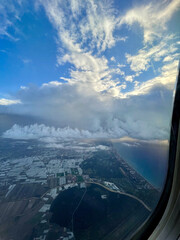 View from airplane window, sky clouds and earth landscape from above, travel photography, aviation perspective, high altitude flight, blue sky horizon, vacation trip, wanderlust concept