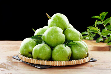 Fresh Green Shaanxi Pears in Wicker Basket - Organic Fruit Harvest June Season