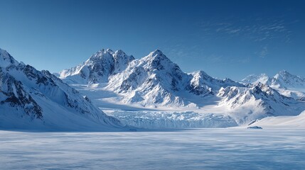 Fototapeta premium Discover majestic snow-capped mountains under a clear blue sky creating a breathtaking winter landscape for inspirational designs