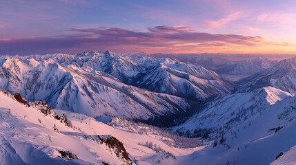 Breathtaking winter wonderland vista with snow-covered mountains glowing under a pink and purple sunrise sky