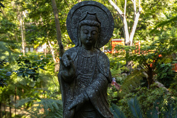 Fototapeta premium Buddha statue in the Monte palace garden in Funchal Madeira Portugal