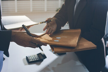 Lawyer explained to the client about the law that must be brought against the court case.