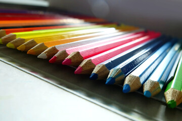 colored pencils on white background