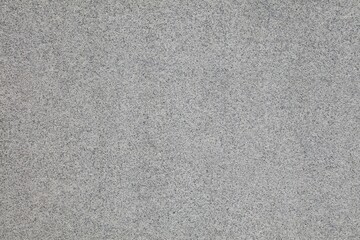 Real stone background. Grey granite natural stone texture background for use on ceramic tiles or as digital background. Flat surface.