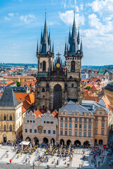 Fototapeta premium An aerial view towards the Church of Our Lady from the City Hall tower in the old town square in central Prague in springtime