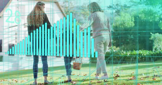 Family holding pumpkin bucket entering frame across lawn while turquoise bars showing tech trends