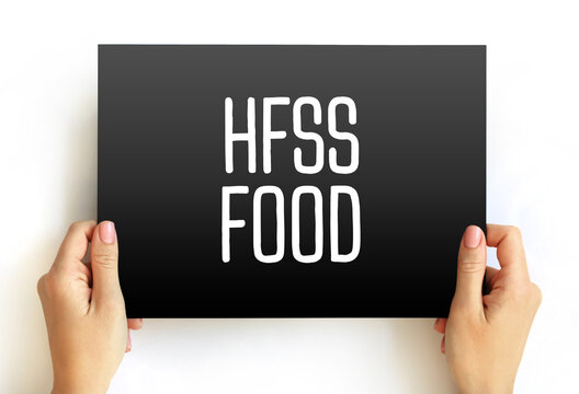 HFSS Food - term for food and beverage products which are high in saturated fat, salt and sugar, text concept on card
