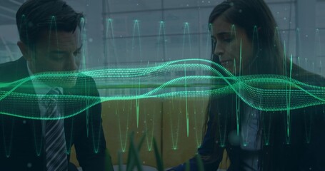 Professionals in suits analyzing green waveform in office lounge, with bench and potted plants