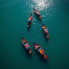 Obraz premium Aerial view of colorful boats on turquoise water