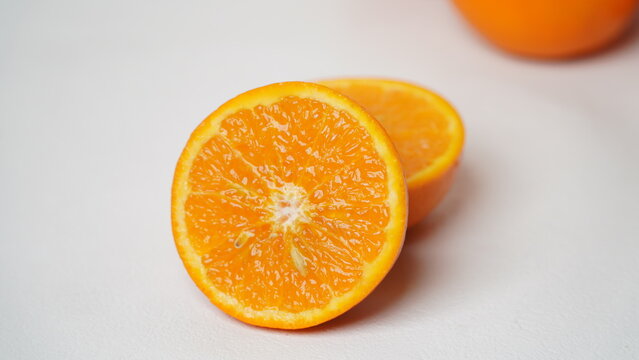 Isolated white Wokam Orange or often known as Mandarin Orange which is still fresh with bright orange skin.