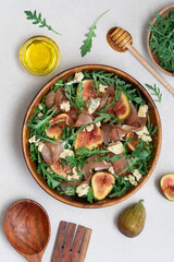 Delicious Salad with Figs, Pastrami, and Blue Cheese, Healthy Gourmet Meal Concept