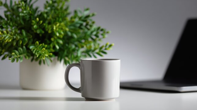 minimal workspace background with laptop, coffee cup, and clean desk