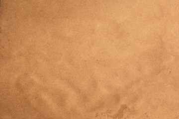 Brown kraft paper with slight wrinkles stains spot