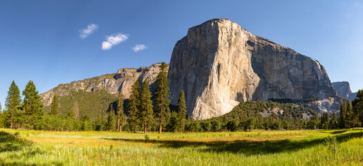 Large summer panorama of El Capitan from Yosemite Valley in Yosemite National Park, California.