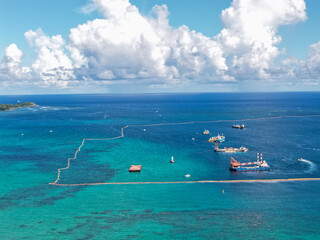 Henoko Land Reclamation Work and Construction Vessels in Oura Bay, Nago City, Okinawa, Japan, Drone Editorial