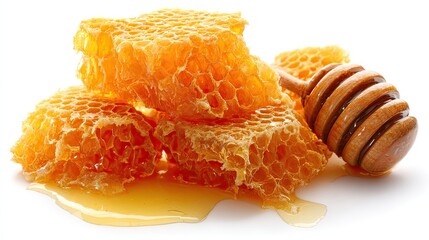 Honeycomb pieces with drizzled honey and wooden dipper