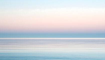 Fototapeta premium Serene Ocean Horizon with Soft Pastel Sky and Calm Water Reflections