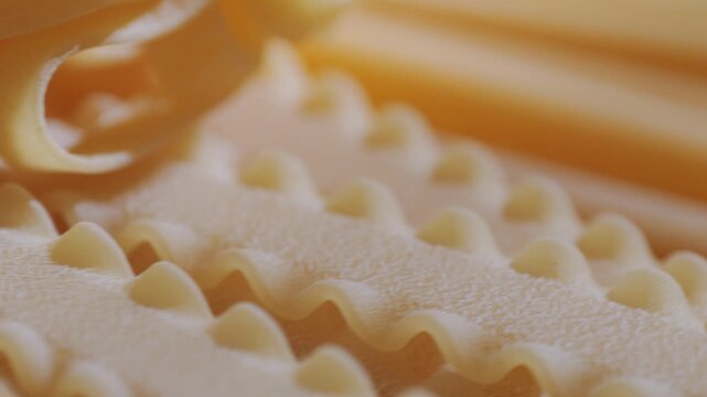 Pasta mix, different Italian tagliatelle fussili pasta packaging window, Fettuccine pasta, close up, not cooked