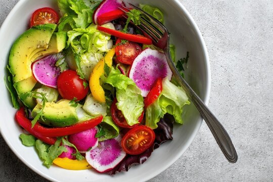 Vibrant salad in white bowl