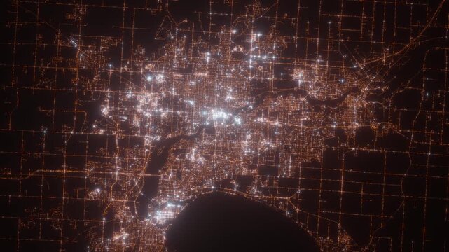 Appleton (Wisconsin, USA) aerial view at night. Top view on modern city with street lights. Camera is zooming out, rotating clockwise
