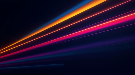 Abstract streaks of red orange and yellow light swirling on a dark blue backdrop motion blur