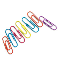 A diagonal line of colorful paper clips in various sizes and colors, isolated on white background