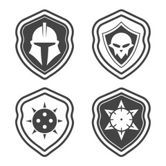 Four black and white shields with skull, helmet and star for game logo isolated on white background fantasy medieval heraldic emblem