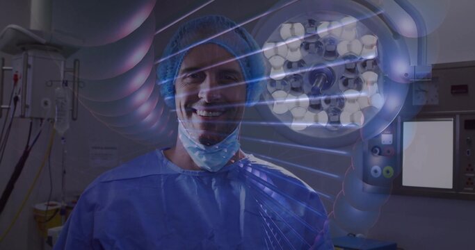 Standing surgeon wearing blue scrubs and mask in OR, with surgical light and molecular overlay
