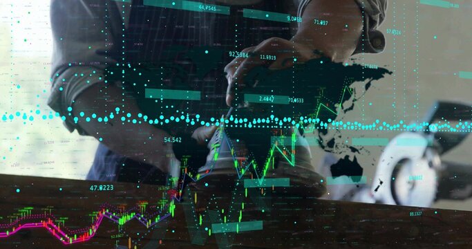 Tying sneaker laces, man sitting at wooden table with laptop, 3D stock charts overlaying world map - Powered by Adobe