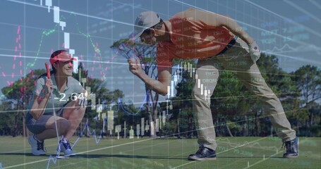 Analyzing couple in polo shirts holding putter examining ball on green, with financial overlay