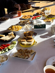 Kyrgyz yurt camp morning table with tea and local pastries