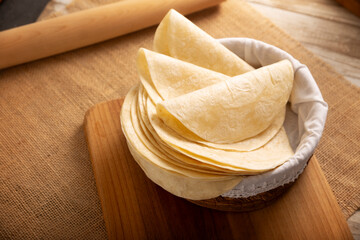 Flour wheat Tortillas, is a flat bread made with wheat flour and lard or butter, without yeast, and widely consumed daily in Mexico, especially in Quesadillas, burritos y Tacos.