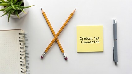 Creative Workspace with Stationery, Plant, and Sticky Note Message