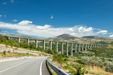 Highway crossing the valley with a long viaduct in Molise, Italy