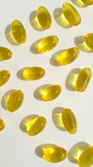 Yellow capsules on white