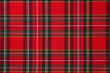 Tartan pattern, checkered, colored, seamless fabric for design or wallpaper background. Close up. Copy space. Top view.