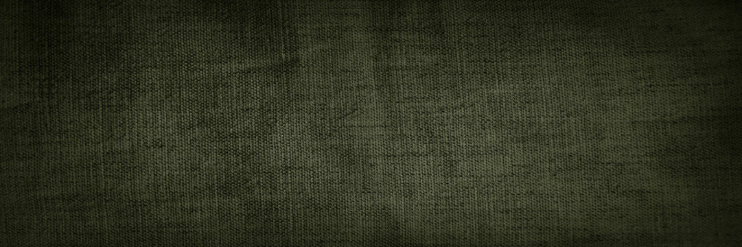 Black dark olive brown green khaki gray natural fabric cloth texture background. Close-up. Empty blank. Design. Template. Army military green color. War security hunting Veteran's day. Wide banner. - Powered by Adobe