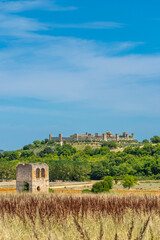 Obraz premium Monteriggioni dominating the Tuscan countryside from its hilltop position