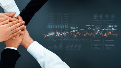A dynamic scene depicting hands of a diverse team coming together over financial graphs,...