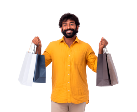 Smiling young man holding shopping bags in casual outfit on transparent background, PNG